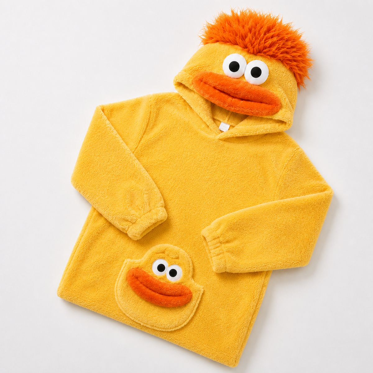 Yellow plush monster onesie folded with orange mouth hood